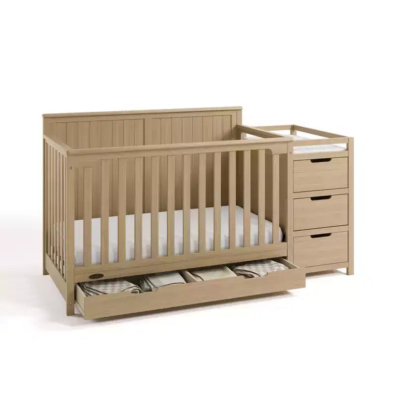 Lit de bébé convertible 5 en 1 avec table à langer et tiroir