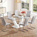Ensemble de table à manger moderne en verre trempé avec piètement en U à motif marbré et chaises rembourrées de similicuir