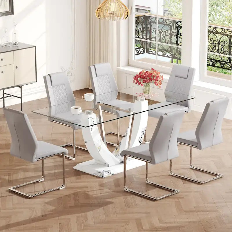 Ensemble de table à manger moderne en verre trempé avec piètement en U à motif marbré et chaises rembourrées de similicuir