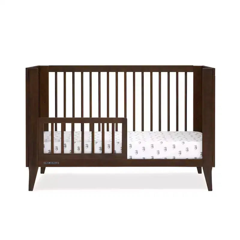 Delta Children Ollie 4-in-1-Umbaubabybett mit Umbaumöglichkeit zum Tagesbett