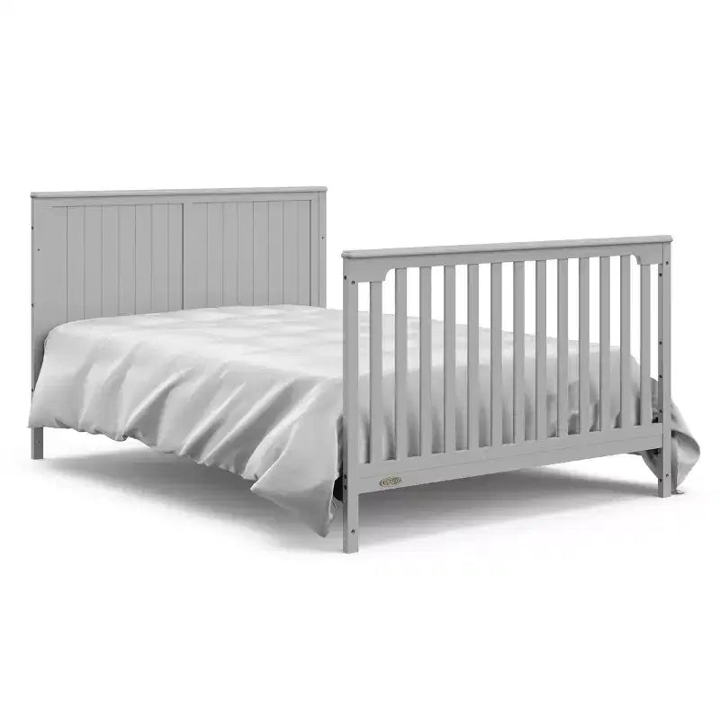 Lit de bébé convertible 5 en 1 avec table à langer et tiroir