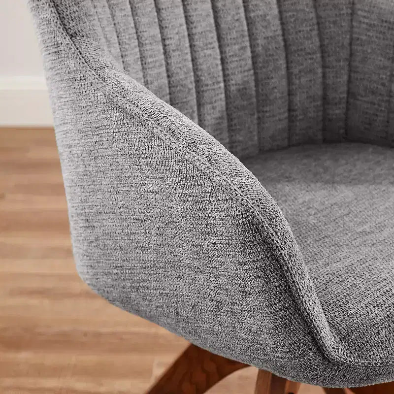 Art Leon comfortabele draaibare fauteuil van stof met poten van massief eikenhout