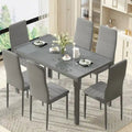 Grondin moderne 7-delige eettafelset met tafelblad van gehard glas en 6 met PU-leer beklede stoelen