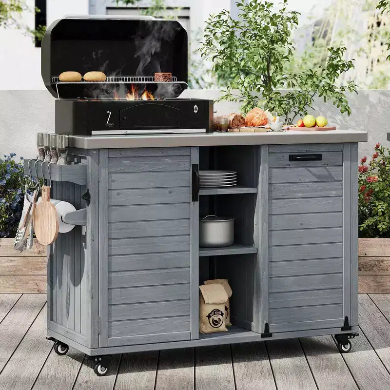 Buiteneiland voor de keuken met inklapbare zijtafel, buitenkeukenwagen met roestvrijstalen blad, verborgen afvalbak voor gazon en tuin