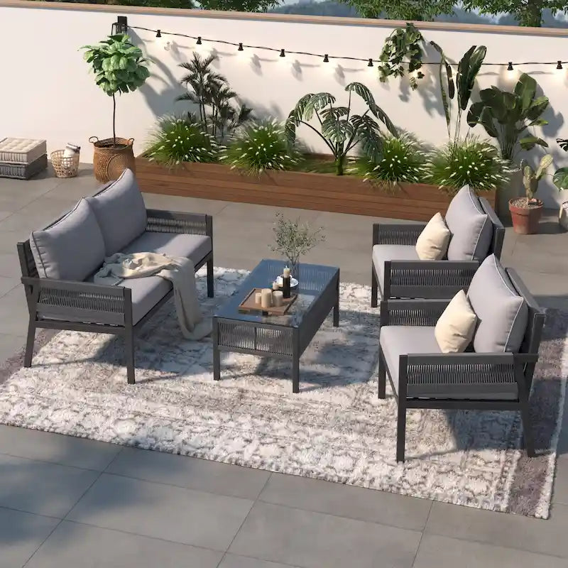 4-teiliges Gartenmöbelset, Sitzgruppe für den Garten mit Tisch aus gehärtetem Glas, tiefer Sitzfläche und dicken Polstern