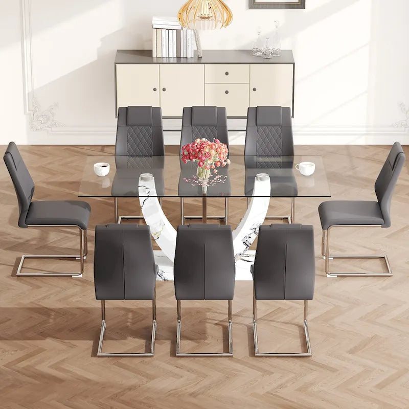 Ensemble de table à manger moderne en verre trempé avec piètement en U à motif marbré et chaises rembourrées de similicuir