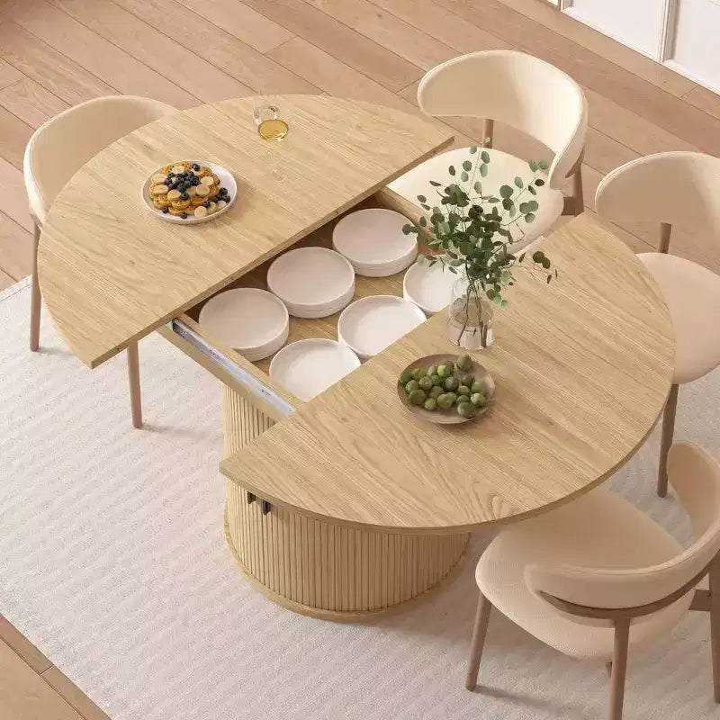 Tavolo da cucina e sala da pranzo rotondo allungabile Dyonery 63, con ripiano contenitore a 2 livelli e base a piedistallo, mobile da pranzo in legno ovale e circolare, noce