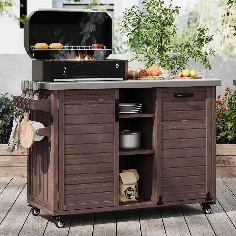 Buiteneiland voor de keuken met inklapbare zijtafel, buitenkeukenwagen met roestvrijstalen blad, verborgen afvalbak voor gazon en tuin