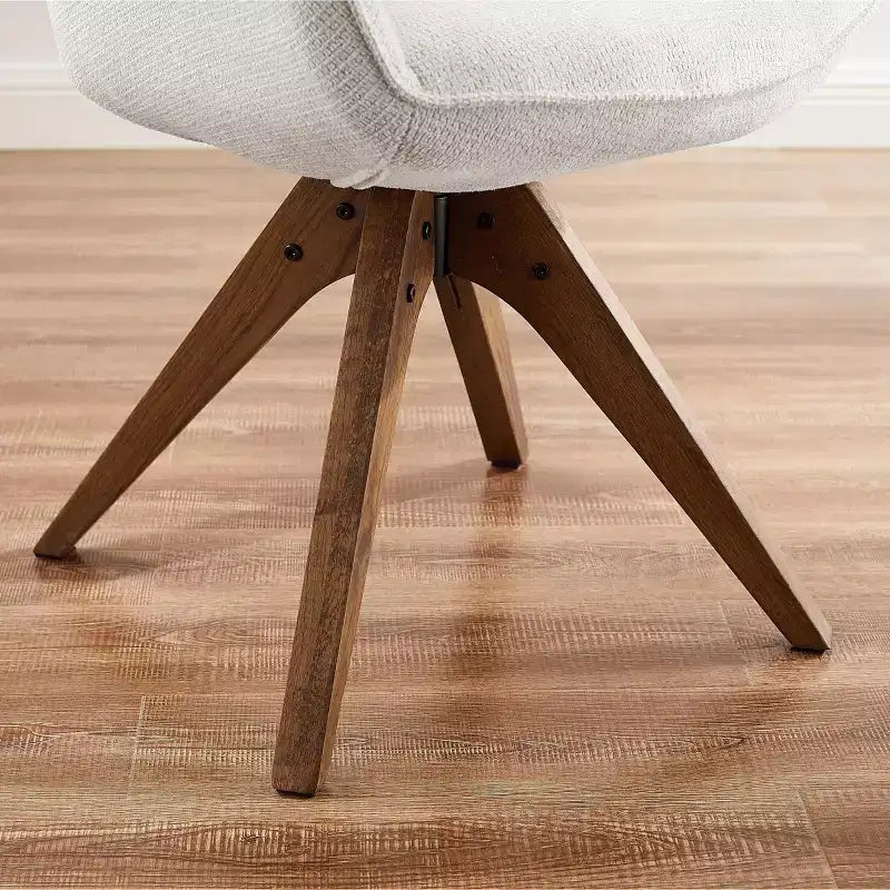 Art Leon comfortabele draaibare fauteuil van stof met poten van massief eikenhout