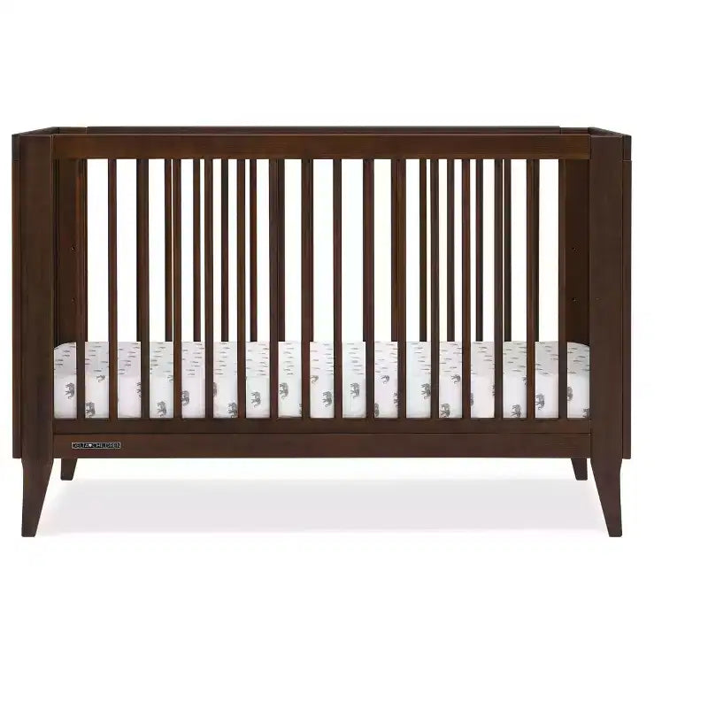 Delta Children Ollie 4-in-1-Umbaubabybett mit Umbaumöglichkeit zum Tagesbett