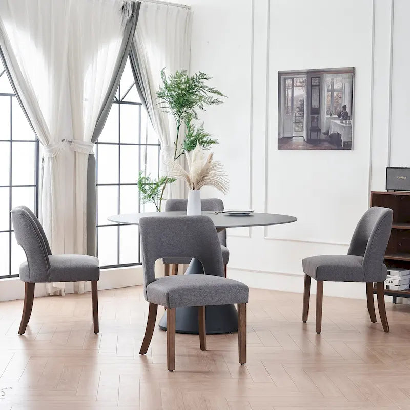 Set van 4 eetkamerstoelen met stoffen bekleding