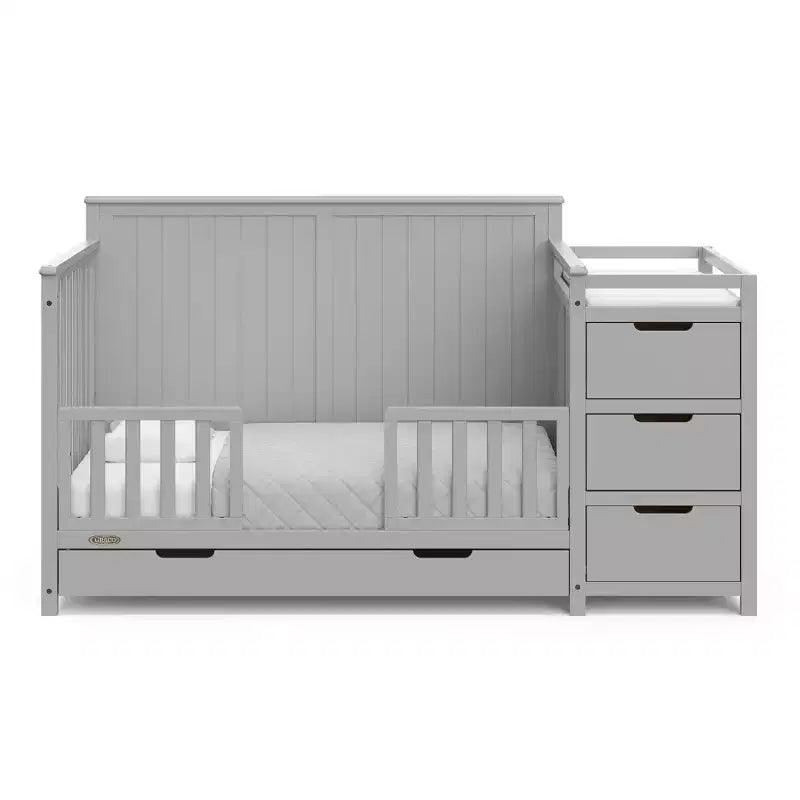 Lit de bébé convertible 5 en 1 avec table à langer et tiroir