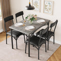 Set da pranzo con tavolo rettangolare per 4 persone e sedie imbottite
