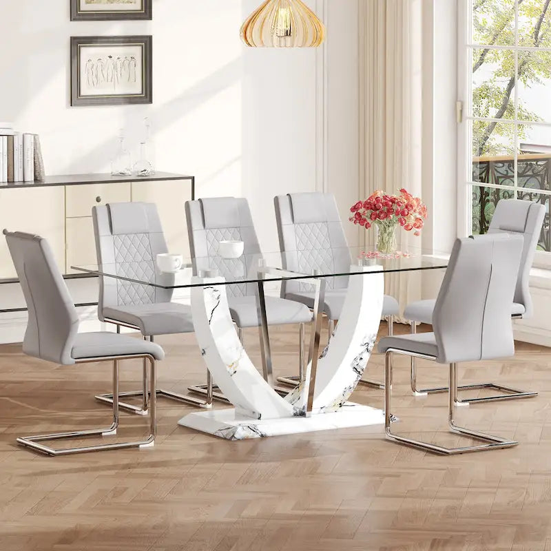 Ensemble de table à manger moderne en verre trempé avec piètement en U à motif marbré et chaises rembourrées de similicuir