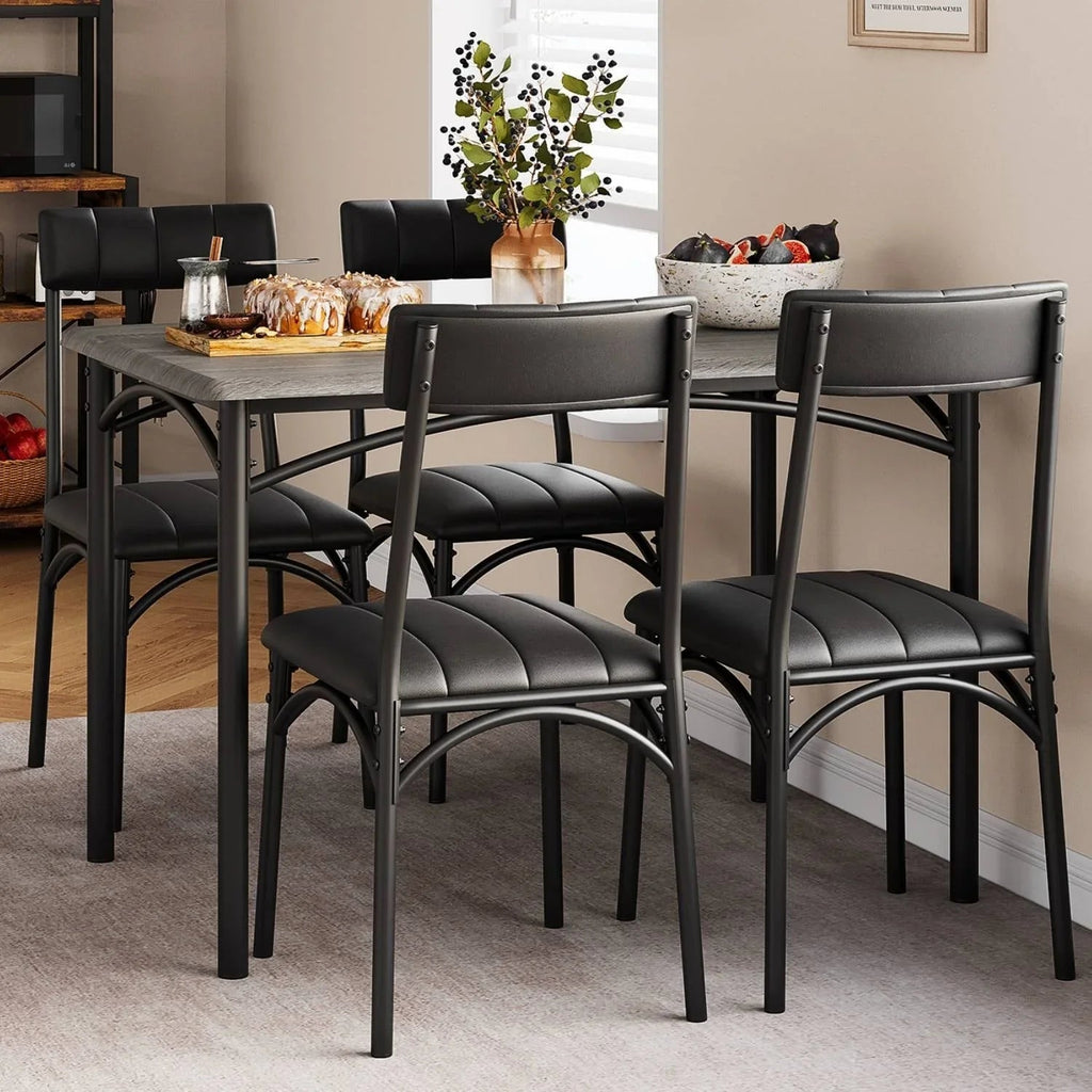 Set da pranzo con tavolo rettangolare per 4 persone e sedie imbottite