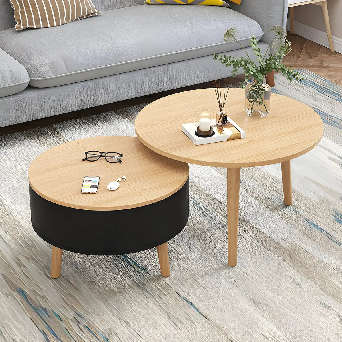 Moderner runder Couchtisch aus Holz in Schwarz und Weiß mit Stauraum