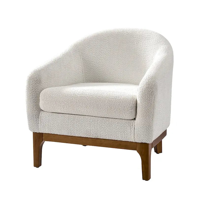 Poltrona a botte moderna in bouclé Augus con gambe in legno massello di HULALA HOME