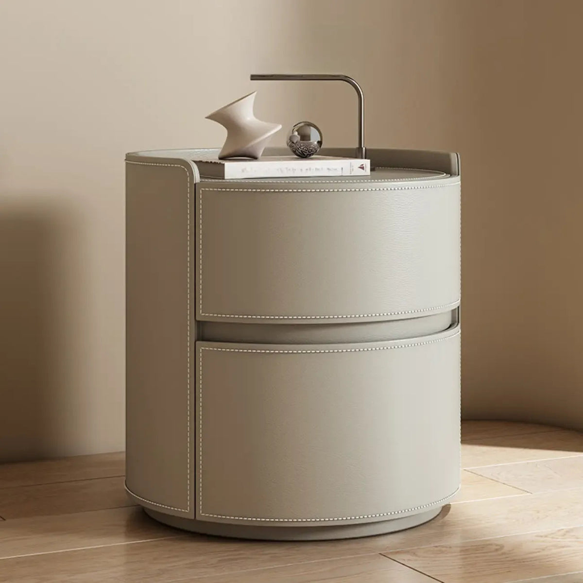 Comodino rotondo moderno con vassoio in pelle e 2 cassetti