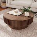 Moderne ronde salontafel van gefineerd massief hout met opbergruimte