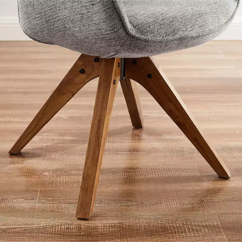 Art Leon comfortabele draaibare fauteuil van stof met poten van massief eikenhout
